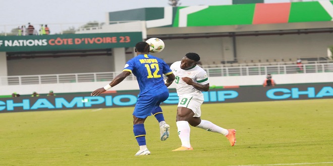 Tanzania's senior national soccer team forward, Simon Msuva (L), battles for possession with Zambia's Lameck Banda as they faced each other in a 2023 Africa Cup of Nations encounter which took place at Laurent Pokou Stadium, San-Pédro last weekend. PHOTO: