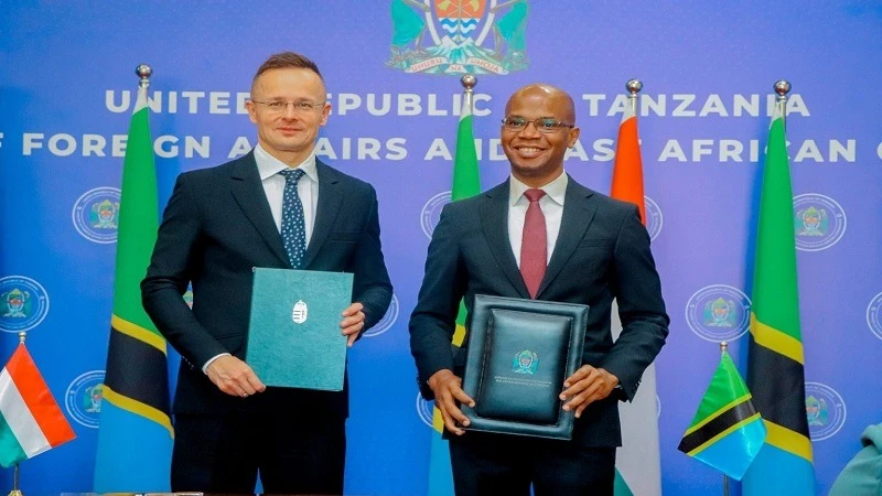 January Makamba (Right), the Foreign Affairs and East Africa Cooperation minister and Hungarian foreign minister Peter Szijjártó (Right) pictured after signing an agreement on light aircraft assembly plant in Morogoro.