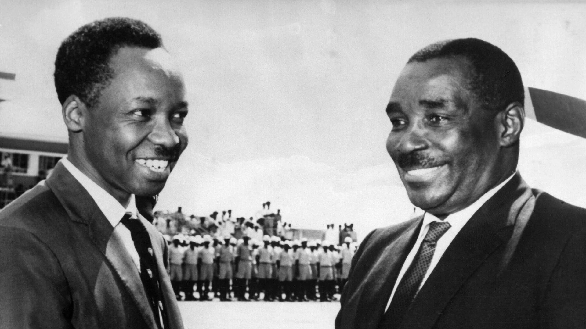 Sheikh Abeid Amani Karume shares a moment of comradeship with former President, Julius Kambarage Nyerere.