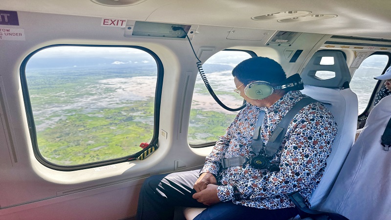 Prime Minister Kassim Majaliwa has an aerial view yesterday – from a helicopter – of the devastation caused by floods induced by incessant heavy rains at Taweta, Masagati, Utengule and Malinyi in Mlimba and Malinyi districts, Morogoro Region. 