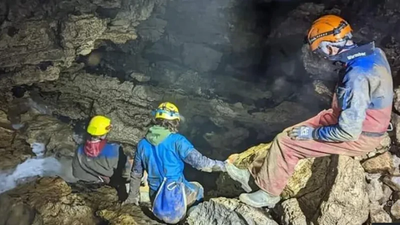 Cavers descend into the Bone Caves' Uamh an Claonaite underground passage