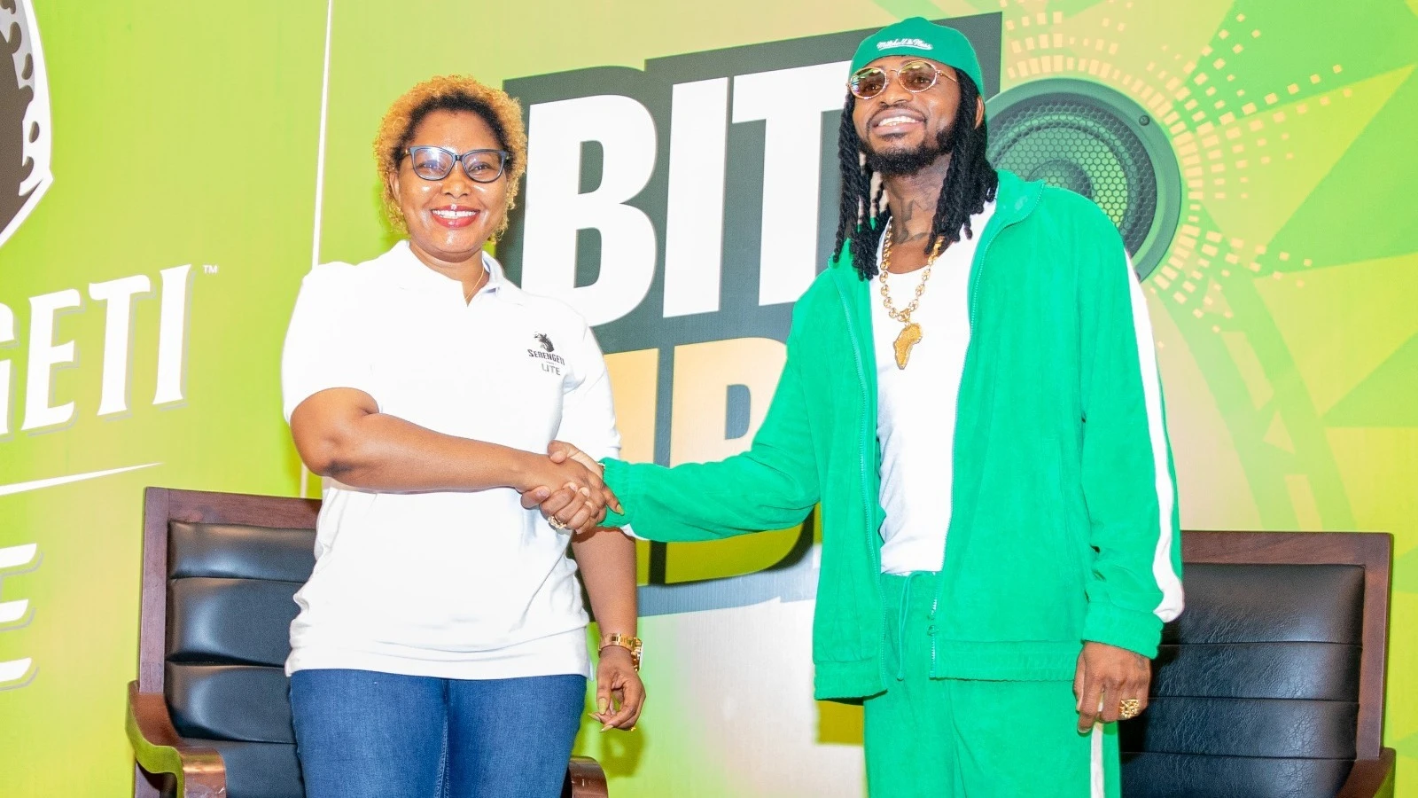 The Senior Brand Manager of SBL, Ester Raphael (left), and music artist Diamond Platnumz (right) in front of journalists (not pictured) when they announced their partnership for the music and cultural festival to be held on April 26th and 27th.