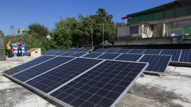 Solar panels line the rooftop of the home of Cuban entrepreneur Felix Morffi, in the municipality of Regla, Havana. 