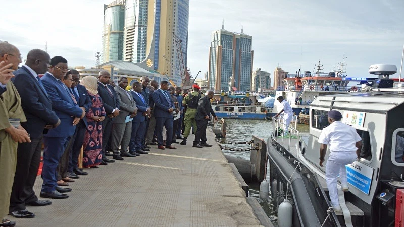 Prime Minister Kassim Majaliwa views one of newly acquired patrol boats meant for use in combating illegal fishing shortly before he graced its launch in Dar es Salaam at the weekend. 