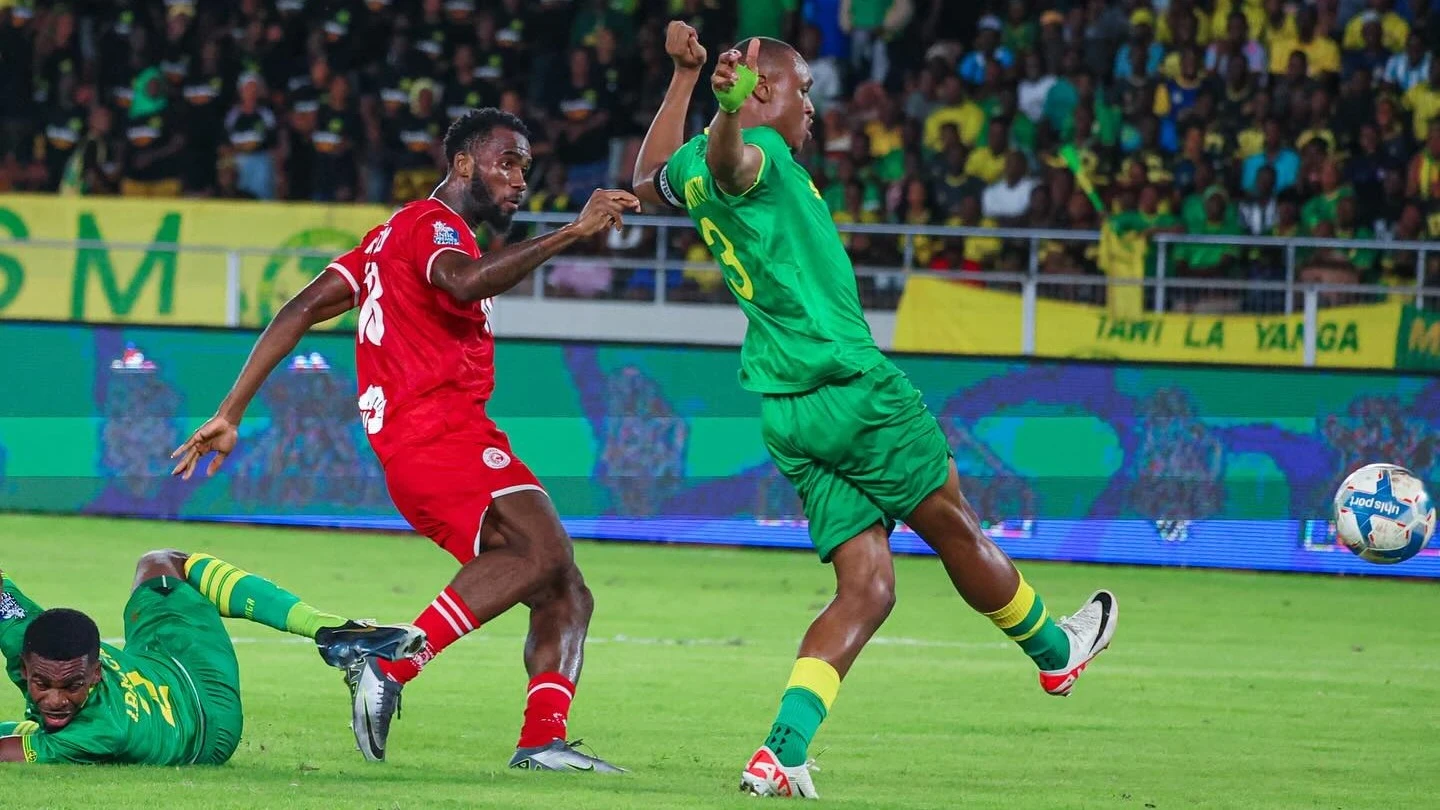 Yanga's central defender, Bakari Mwamnyeto (R), keeps Simba SC's forward Freddy Michael in check in this season's NBC Premier League tie that took place in Dar es Salaam on April 20 and ended in a 2-1 victory for Yanga.