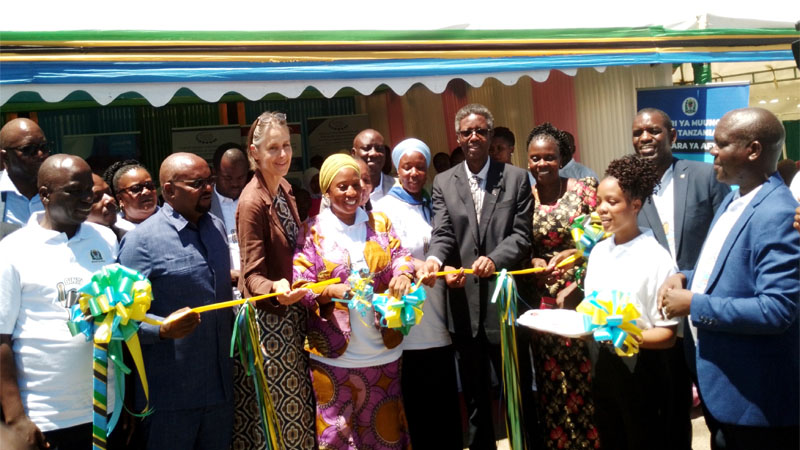  Health minister Ummy Mwalimu (C, in head-cloth) cuts the ribbon in Mwanza city earlier this week to launch a human papillomavirus infection (HPV) vaccination campaign. 
