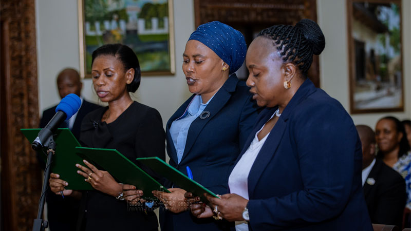 Deputy Director of Public Prosecutions Bibiana Joseph Kileo (R), Deputy State Attorney General Alice Edward Mtulo (C) and Tanzania Law Reform Commission chairperson Winfrida Beatrice Korosso take the Oath for Ethical Leadership at  Dar State House .