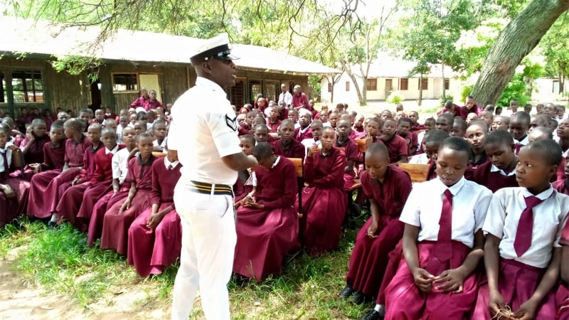  Selemani Maulid, a Traffic Police officer based in Kwimba District, pictured at the weekend taking students of Imalilo Secondary School through the basics of road safety. 