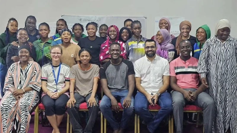 
Tanzanian Cricket Association (TCA) vice chairman Ashish Nagewadia (sitting 2nd R), and the association's CEO Hamisi Abdallah (sitting R) are pictured with International School of Tanganyika's English teachers and senior national women's cricket squad .
