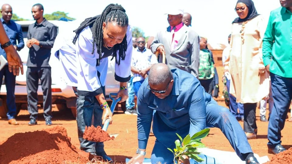  

Ruvuma Regional Commissioner (RC), Colonel Ahmed Abbas plant a tree at the Namtumbo seed farm in Ruvuma during a farmer's field day. Assisting him left is ASA's CEO, Dr Sophia Kashenge