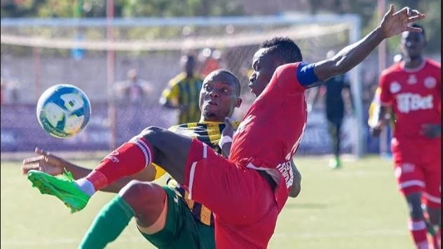 Kagera Sugar's attacker, Mbaraka Yusuph (L), seeks to outfox Simba SC's left fullback Mohamed Hussein when the clubs took on each other in this season's NBC Premier League clash that took place in Kagera last weekend and ended in a 1-1 draw. 