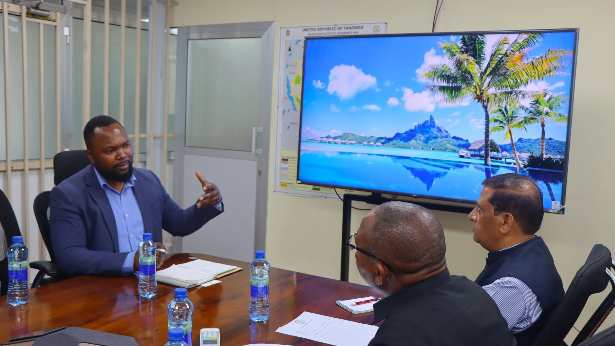 The Acting Director General of PURA, Eng. Danstan Asanga explains about the fifth licencing round during the meeting with delegation from High Commission of India in Tanzania led by Second Secretary to the High Commissioner (Commerce), Narender Kumar (R)
