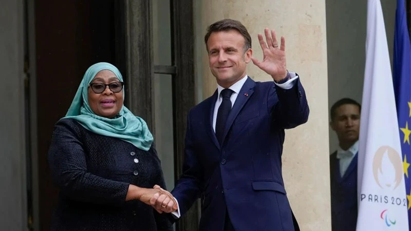 President Samia Suluhu Hassan (L), President Emmanuel Macron (R). pictured during the summit on clean cooking in Africa held at UNESCO headquarters in Paris.