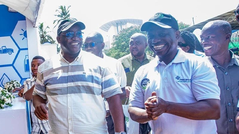 Said Mtanda, Mwanza regional commissioner (center) having a happy moment with Prof. Zacharia Masanyiwa (right) chairperson of the Tanzania Dairy Board board of trustees during his visit at the ongoing dairy week exhibition held in Mwanza city.