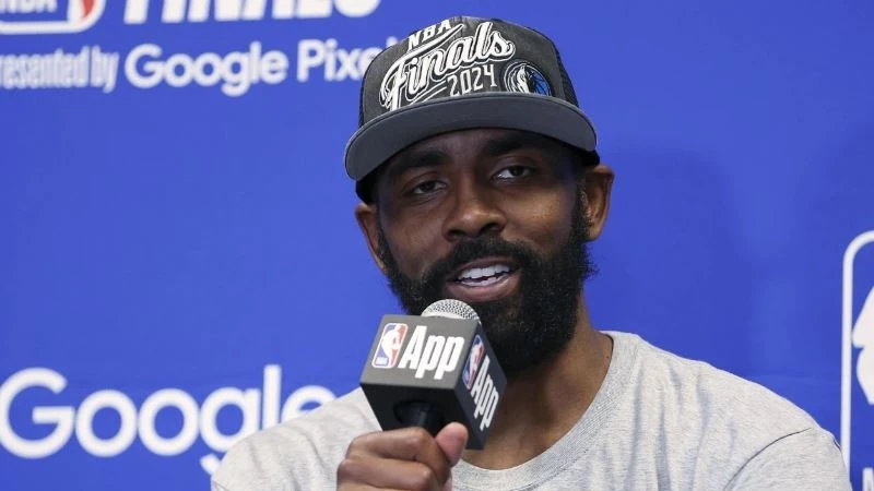 Dallas Mavericks guard Kyrie Irving answers questions during a news conference after the Mavericks defeated Minnesota Timberwolves in Game 5 of the NBA basketball Western Conference finals, on Thursday, May 30, 2024, in Minneapolis